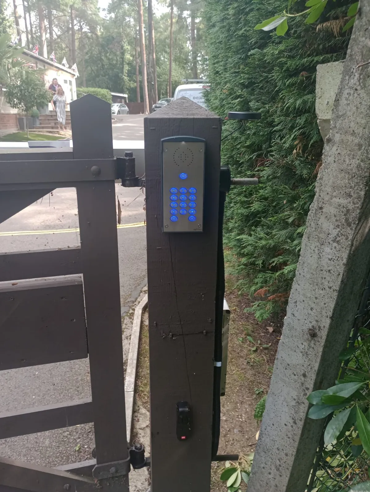 A LynixSIM-connected intercom mounted on a gate post